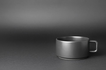 Blank cup on dark background