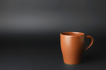 Blank cup on dark background