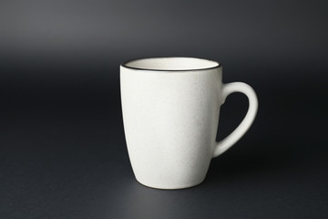 Blank cup on dark background