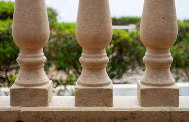 stone balustrade on covered terrace facing outside