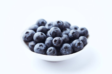 Bilberries isolated on white background. Concept for healthy nutrition. 