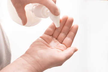 Hand sanitizer prevent virus and plague infection, prevent covid-19 virus. man disinfects hands