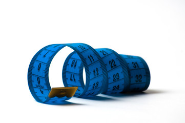 Centimeter on white background. Diet and Weight Loss Concept