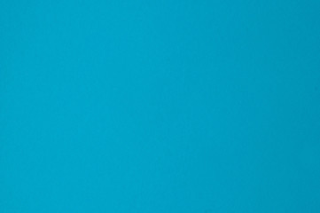 Blue paper texture, blue background with place for text.