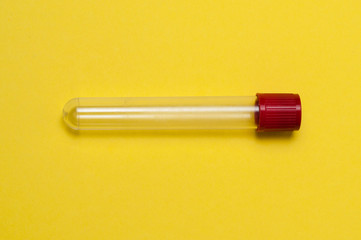 Naklejka premium One blood collection tube on a yellow background
