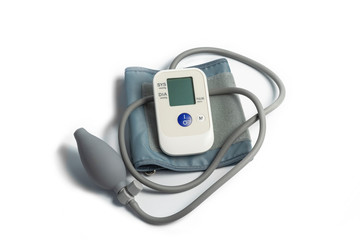 On white background. The manometer is semi-automatic for measuring blood pressure. Close-up