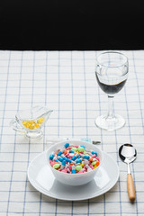 a plate of pills and medications on the table