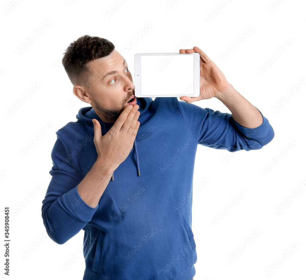 Poster surprised man with tablet computer on white background