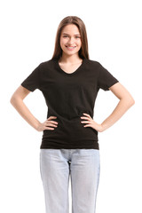 Fototapeta premium Young woman in stylish t-shirt on white background