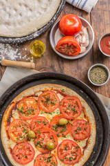 making homemade neapolitan pizza top view