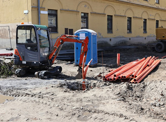 Front end loader at the road construction