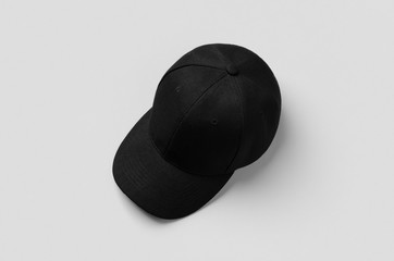 Black baseball cap mockup on a grey background.
