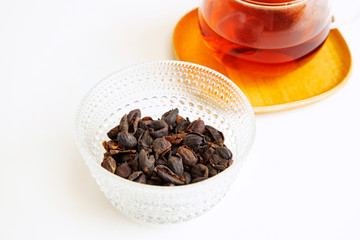 Coffee cherry tea on the white background