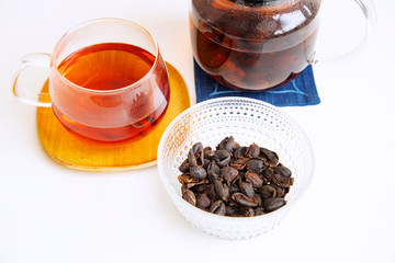Coffee cherry tea on the white background