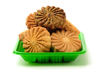 Cookies made of whole grain cereals on a white background