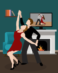 Man and woman dancing at home in the living room. Pair of dancers. Dancing on video lessons at home. Quarantine. Stay at home