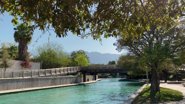 beautiful scene in Santa Lucia park - Monterrey. Cristal clear water of the biggest artificial river in Latin america. Mexico