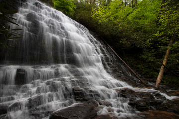 Fototapeta na wymiar Dramatic lighting on beautiful waterfall in the upstate region of South Carolina, USA