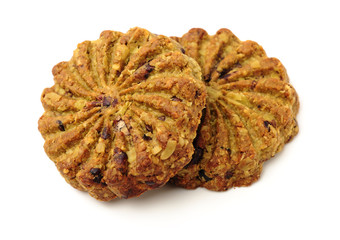 Cookies made of whole grain cereals on a white background