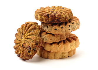 Cookies made of whole grain cereals on a white background