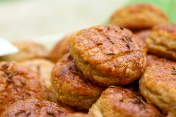 Homemade Pork Rind Biscuits with cumin seeds. Baked to a goldsmith. Salty cookies made of ground pork cracklings and sprinkled with cumin. Traditional Slovak and Czech food.