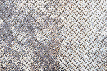 Old and rusted Metal diamond plate pattern texture, background