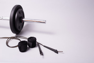 Combat sport equipment: boxing gloves, jump rope and hand bands