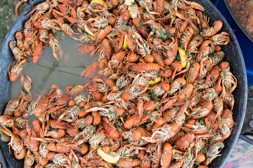 Close up image of freshly boiled crayfish on outdoor outside cooking wok