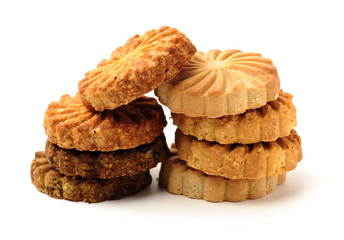 Cookies made of whole grain cereals on a white background
