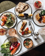 Colourful vegetarian lunch spread flatlay in a restaurant