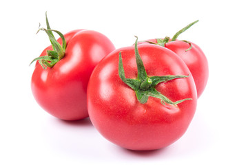 Red fresh tomatoes isolated on white background in close-up