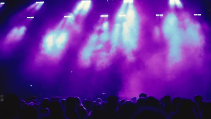Concert and live music. Silhouettes of concert crowd and  stage lights