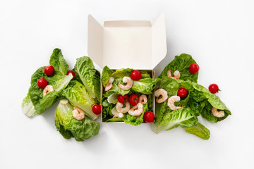 take away box vegan burger with shrimp salad