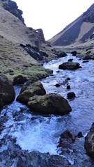 A majestic mountain valley carved by nature, river and glacier.
