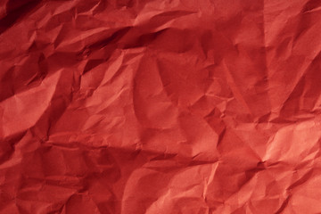Crumpled vintage red paper, abstract background