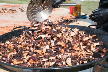 Octopus small chopped bites, street food festival. Seafood festival.