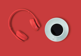 a headphones, Top view of headphones and black coffee cup on red background. Minimalist photo of earphones with copy space. red dj headphones, red headphones and coffee cup on red background