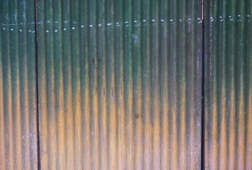 Corrugated metal with colorful gradient abstract horizontal background texture