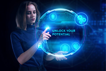 Business, Technology, Internet and network concept. Young businessman working on a virtual screen of the future and sees the inscription: Unlock your potential