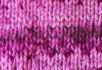Background of lilac woolen knitted texture macro