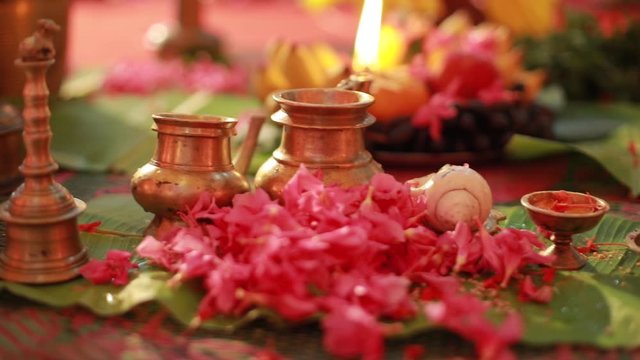 Traditional south Indian brass oil lamp 'Nilavilakku '. During events like housewarming, marriage etc., the Nilavilakku is lighted before starting the rituals. This video is taken during a wedding