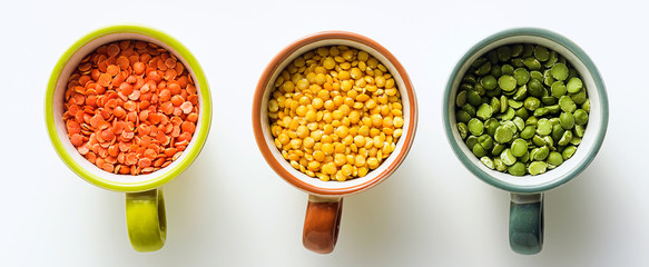banner of lentils of different types and colors in portioned cups. vegan proteins.