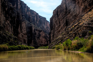 Cliff wall between Mexico and the USA