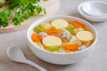 Clear soup with egg tofu and minced pork, Thai food