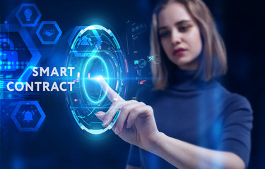 Business, Technology, Internet and network concept. Young businessman working on a virtual screen of the future and sees the inscription: Smart contract
