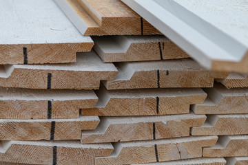 Wooden boards are stacked on site