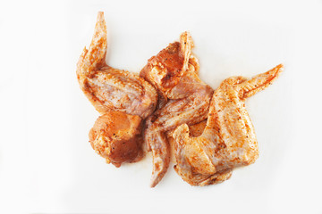 Wings marinated Set. Chicken Meat in Realistic Style for Fliers Banners Ads. Raw chicken wings isolated on white background, clipping path included. Meat shop.