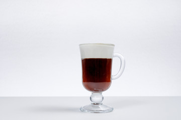 closeup of an irish coffee isolated on a white background