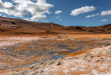 Beautiful Colorful Wild Nature landscape. Iceland Country of Vulcans. Hverarondor Hverir geothermal area in the north of Iceland near Lake Myvatn. Fantastic Iceland scenery. popular travel location.
