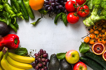 Fresh vegetables and fruits on a white kitchen table. Background for supermarkets, fresh food stores, delivery.